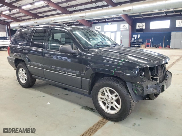 2003 Jeep Grand Cherokee Laredo with VIN 1J4GW48S23C613471, listed as a Copart auction lot 49521865 with 189,918 mi miles and Salvage Title. Bid and sale history available at carsss.com. Image 4.
