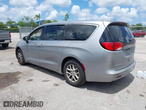 2017 Chrysler Pacifica Touring with VIN 2C4RC1DG7HR516711, listed as a IAAI auction lot 42633544 with 97,853 mi miles and . Bid and sale history available at DreamBid. Image 3.