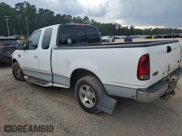 2002 Ford F-150 XL with VIN 1FTRX17L72NB60083, listed as a Copart auction lot 63627985 with Not provided miles and Salvage title. Bid and sale history available at DreamBid. Image 2.