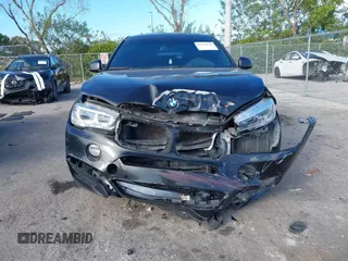 2018 BMW X6 sDrive35i with VIN 5UXKU0C5XJ0G80724, listed as a IAAI auction lot 41274338 with 122,696 mi miles. Bid and sale history available at carsss.com. Image 6.