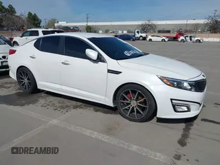 2015 Kia Optima LX z VIN KNAGM4A74F5664784, wystawiony jako IAAI lot #41828570 z przebiegiem 111 925 mil mil oraz . Historia ofert i sprzedaży dostępna na DreamBid. Obrazek 1.
