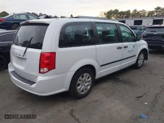 2015 Dodge Grand Caravan SE with VIN 2C4RDGBG0FR615676, listed as a IAAI auction lot 41301753 with 41,103 mi miles. Bid and sale history available at carsss.com. Image 4.