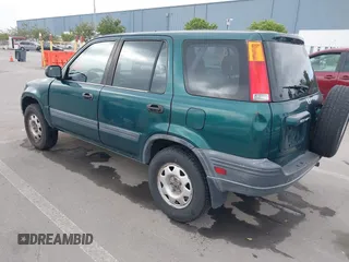 1999 Honda CR-V LX with VIN JHLRD284XXC002638, listed as a IAAI auction lot 42110994 with 164,706 mi miles. Bid and sale history available at carsss.com. Image 3.