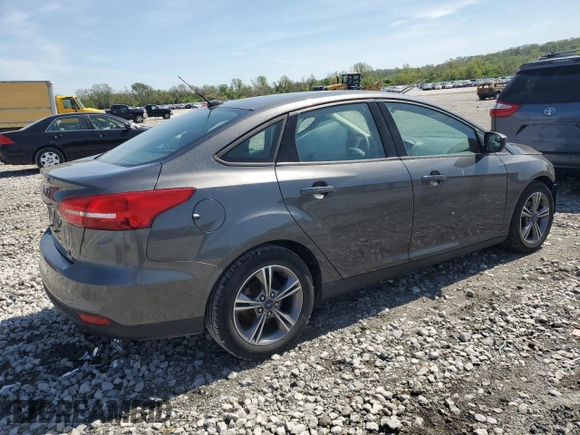 2018 Ford Focus SE с VIN 1FADP3FE5JL312063, выставлен на аукционе Copart как лот 53882065 с пробегом 82 743 миль миль и Списание • Salvage title. История ставок и продаж доступна на DreamBid. Изображение 3.