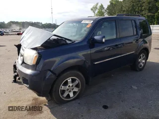 2011 Honda Pilot Touring z VIN 5FNYF4H99BB105507, wystawiony jako Copart lot #54121155 z przebiegiem 187 808 mil mil oraz Szkoda całkowita • Salvage title. Historia ofert i sprzedaży dostępna na DreamBid. Obrazek 1.