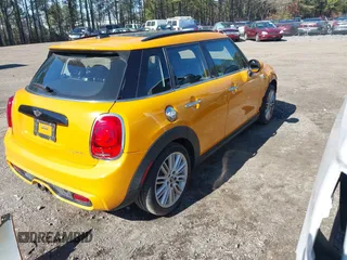 2018 MINI Hardtop 4 Door Cooper S with VIN WMWXU3C53J2F50987, listed as a IAAI auction lot 41682930 with 70,938 mi miles and . Bid and sale history available at DreamBid. Image 4.
