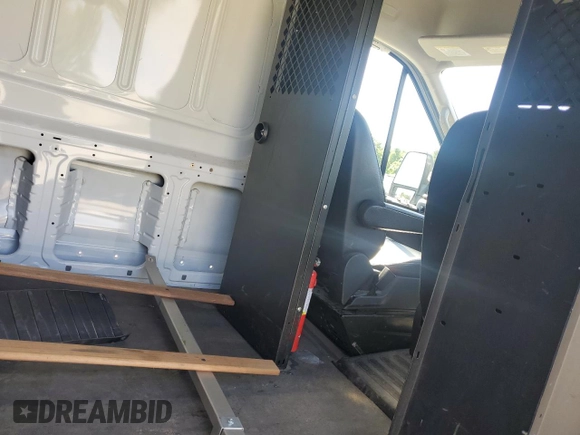 2021 Ford Transit Cargo z VIN 1FTBR1X85MKA45784, wystawiony jako Copart lot #58608665 z przebiegiem 65 342 mil mil oraz Szkoda całkowita • Salvage title. Historia ofert i sprzedaży dostępna na DreamBid. Obrazek 11.
