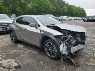 2021 Lexus UX with VIN JTHX9JBH9M2042298, listed as a Copart auction lot 50257753 with 38,328 mi miles. Bid and sale history available at carsss.com. Image 4.