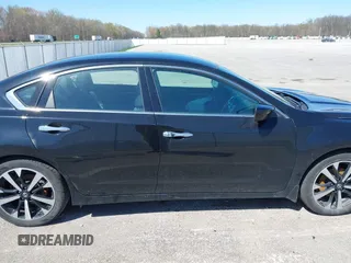2018 Nissan Altima SV with VIN 1N4AL3AP5JC285843, listed as a IAAI auction lot 41956374 with 100,688 mi miles and . Bid and sale history available at carsss.com. Image 13.