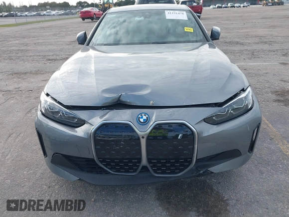 2024 BMW i4 eDrive35 z VIN WBY43AW00RFT13208, wystawiony jako IAAI lot #41191478 z przebiegiem 9 638 mil mil oraz . Historia ofert i sprzedaży dostępna na DreamBid. Obrazek 6.