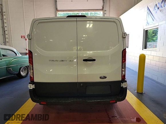 2015 Ford Transit Cargo with VIN 1FTNE1YM7FKB29922, listed as a IAAI auction lot 42842343 with 217,184 mi miles and . Bid and sale history available at DreamBid. Image 8.