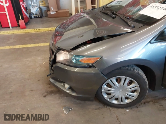 2010 Honda Insight LX with VIN JHMZE2H54AS040316, listed as a IAAI auction lot 41572246 with 142,850 mi miles and . Bid and sale history available at DreamBid. Image 6.
