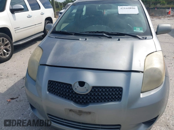 2008 Toyota Yaris with VIN JTDJT923185180160, listed as a IAAI auction lot 42169896 with 340,931 mi miles. Bid and sale history available at carsss.com. Image 6.