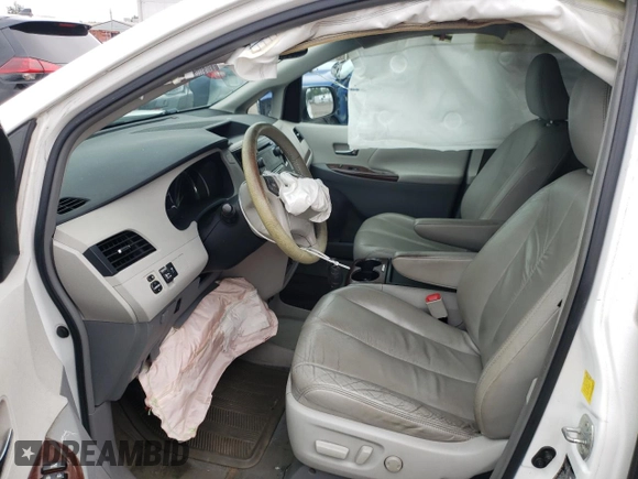 2011 Toyota Sienna XLE AAS with VIN 5TDYK3DCXBS063948, listed as a Copart auction lot 59776695 with 305,799 mi miles and Salvage title. Bid and sale history available at DreamBid. Image 7.