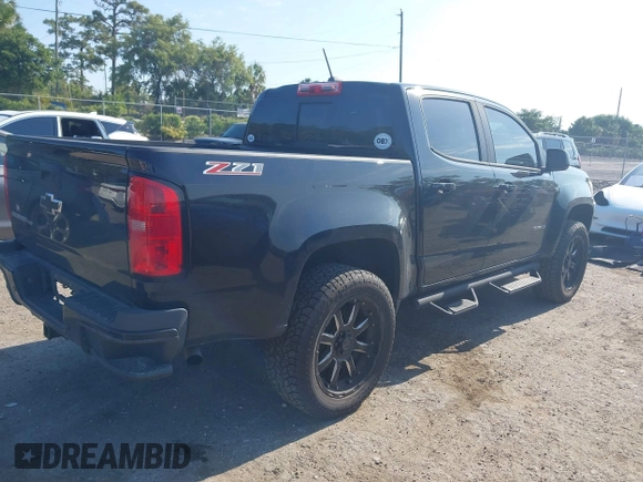 2020 Chevrolet Colorado 2WD Z71 z VIN 1GCGSDEN2L1122555, wystawiony jako IAAI lot #42096724 z przebiegiem 120 679 mil mil oraz . Historia ofert i sprzedaży dostępna na DreamBid. Obrazek 4.