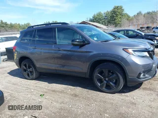 2021 Honda Passport Elite with VIN 5FNYF8H08MB011467, listed as a IAAI auction lot 41929708 with 34,106 mi miles. Bid and sale history available at carsss.com. Image 13.