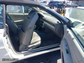 2006 Chrysler Sebring Conv Touring with VIN 1C3EL55R86N135731, listed as a IAAI auction lot 41693953 with 170,628 mi miles. Bid and sale history available at carsss.com. Image 5.