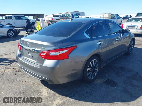 2016 Nissan Altima S z VIN 1N4AL3AP8GC139770, wystawiony jako IAAI lot #41750812 z przebiegiem 116 717 mil mil oraz . Historia ofert i sprzedaży dostępna na DreamBid. Obrazek 4.