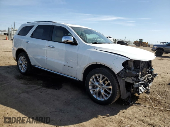 2014 Dodge Durango Citadel with VIN 1C4SDJETXEC331082, listed as a Copart auction lot 48679195 with 155,273 mi miles and Salvage title. Bid and sale history available at DreamBid. Image 4.