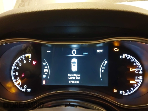 2018 Jeep Grand Cherokee Laredo E with VIN 1C4RJFAG6JC499261, listed as a IAAI auction lot 41033418 with 67,554 mi miles and . Bid and sale history available at DreamBid. Image 7.