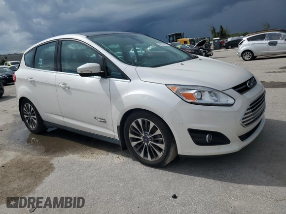 2017 Ford C-Max Energi Titanium with VIN 1FADP5FU9HL100117, listed as a Copart auction lot 69279074 with 153,601 mi miles and Salvage Title. Bid and sale history available at carsss.com. Image 4.