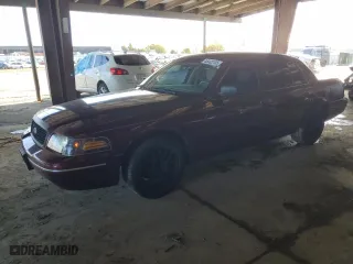 2005 Ford Crown Victoria LX with VIN 2FAFP74W15X130249, listed as a Copart auction lot 45402105 with 150,921 mi miles and Salvage Title. Bid and sale history available at carsss.com. Image 1.
