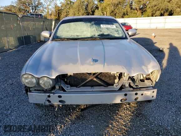 2004 Jaguar XJ with VIN SAJWA71C84SG32106, listed as a Copart auction lot 81837704 with 119,268 mi miles and Salvage Title. Bid and sale history available at carsss.com. Image 5.