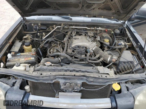 2004 Nissan Frontier XE с VIN 1N6ED27T74C423892, выставлен на аукционе Copart как лот 88106455 с пробегом 142 794 миль миль и Списание • Salvage title. История ставок и продаж доступна на DreamBid. Изображение 11.