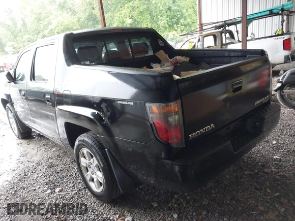 2007 Honda Ridgeline RTL with VIN 2HJYK16547H549241, listed as a IAAI auction lot 42282477 with 214,685 mi miles and . Bid and sale history available at DreamBid. Image 3.