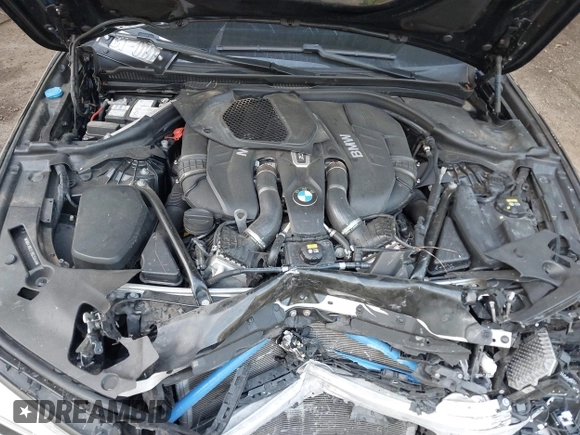 2018 BMW 5 Series M550i xDrive with VIN WBAJB9C51JB035949, listed as a IAAI auction lot 42085727 with Not provided miles and . Bid and sale history available at DreamBid. Image 10.
