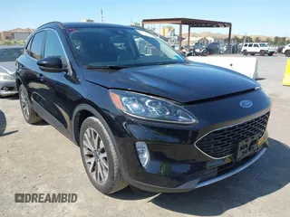 2020 Ford Escape Titanium with VIN 1FMCU9J97LUB18350, listed as a IAAI auction lot 42574736 with 82,551 mi miles and . Bid and sale history available at DreamBid. Image 1.