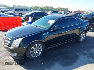 2008 Cadillac CTS AWD w/1SB with VIN 1G6DT57V280213375, listed as a IAAI auction lot 40646045 with 125,835 mi miles. Bid and sale history available at carsss.com. Image 2.