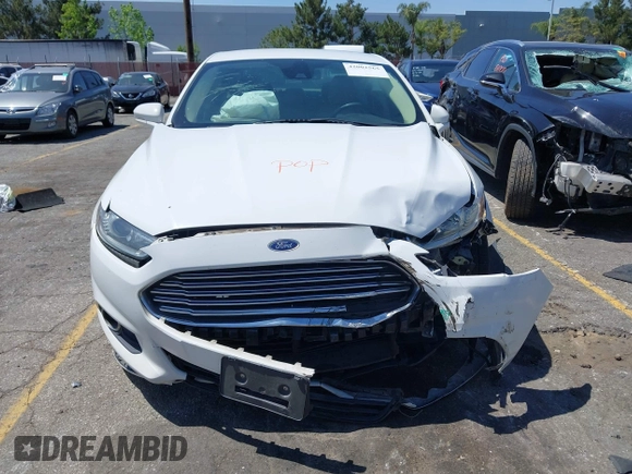 2016 Ford Fusion Energi SE Luxury with VIN 3FA6P0PU7GR206589, listed as a IAAI auction lot 42002565 with 215,789 mi miles. Bid and sale history available at carsss.com. Image 6.