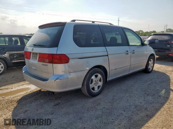 2001 Honda Odyssey EX with VIN 2HKRL18641H619203, listed as a Copart auction lot 59329555 with 180,058 mi miles and Clean title. Bid and sale history available at DreamBid. Image 3.