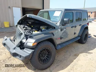 2019 Jeep Wrangler Unlimited Sport S with VIN 1C4HJXDG3KW662946, listed as a IAAI auction lot 42157025 with 26,096 mi miles and . Bid and sale history available at DreamBid. Image 16.