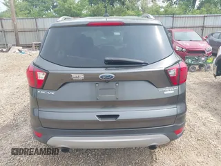 2019 Ford Escape Titanium with VIN 1FMCU0J97KUA34281, listed as a IAAI auction lot 42409579 with 55,400 mi miles and . Bid and sale history available at DreamBid. Image 17.