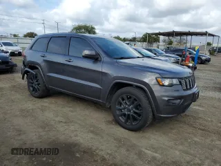 2018 Jeep Grand Cherokee Altitude with VIN 1C4RJEAG7JC322499, listed as a Copart auction lot 51482955 with 107,534 mi miles and Salvage Title. Bid and sale history available at carsss.com. Image 4.