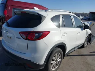 2015 Mazda CX-5 Sport with VIN JM3KE2BE3F0449722, listed as a IAAI auction lot 41825810 with 181,949 mi miles and . Bid and sale history available at DreamBid. Image 4.