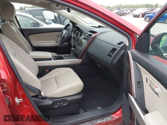 2015 Mazda CX-9 Grand Touring with VIN JM3TB2DA6F0460785, listed as a IAAI auction lot 42474705 with 62,202 mi miles and . Bid and sale history available at DreamBid. Image 5.