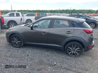 2017 Mazda CX-3 Touring z VIN JM1DKFC79H0162745, wystawiony jako IAAI lot #42318637 z przebiegiem 68 465 mil mil oraz . Historia ofert i sprzedaży dostępna na DreamBid. Obrazek 14.