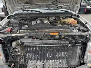 2010 Ford F-350 z VIN 1FTWX3BR4AEA62265, wystawiony jako Copart lot #57976805 z przebiegiem 143 041 mil mil oraz Czysty tytuł • Clean title. Historia ofert i sprzedaży dostępna na DreamBid. Obrazek 7.
