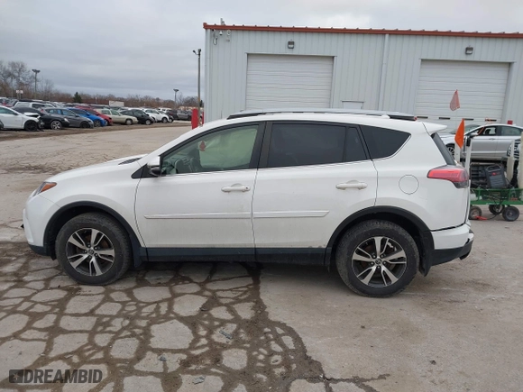 2018 Toyota RAV4 XLE with VIN JTMRFREV6JJ734927, listed as a IAAI auction lot 41510616 with 119,687 mi miles. Bid and sale history available at carsss.com. Image 14.