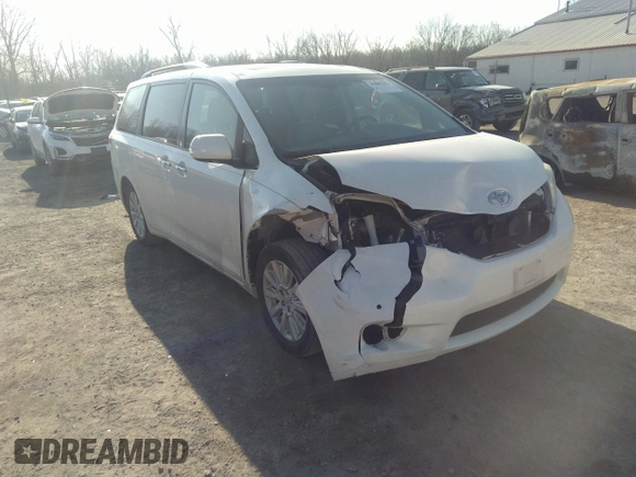 2014 Toyota Sienna XLE with VIN 5TDYK3DC3ES491381, listed as a IAAI auction lot 41803362 with 253,940 mi miles. Bid and sale history available at carsss.com. Image 1.