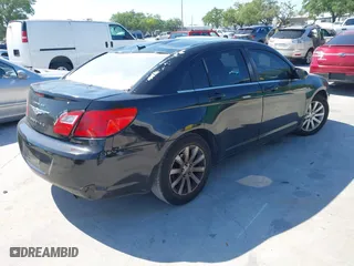 2010 Chrysler Sebring Limited with VIN 1C3CC5FB4AN143410, listed as a IAAI auction lot 41897598 with 159,651 mi miles. Bid and sale history available at carsss.com. Image 4.