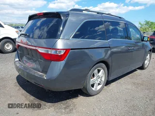 2011 Honda Odyssey Touring Elite with VIN 5FNRL5H96BB043339, listed as a IAAI auction lot 42174767 with 161,233 mi miles and . Bid and sale history available at DreamBid. Image 4.