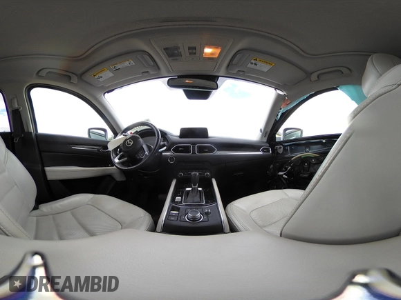 2019 Mazda CX-5 Grand Touring with VIN JM3KFBDM2K0603400, listed as a IAAI auction lot 42051135 with 59,448 mi miles and . Bid and sale history available at DreamBid. Image 18.