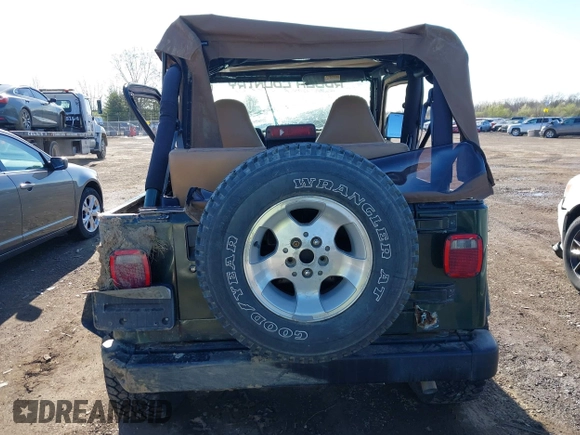 1998 Jeep Wrangler SE with VIN 1J4FY29P6WP709203, listed as a IAAI auction lot 41962877 with 1 mi miles. Bid and sale history available at carsss.com. Image 15.