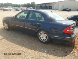2003 Mercedes-Benz E-Class 3.2L with VIN WDBUF65JX3A313638, listed as a Copart auction lot 70869194 with 142,524 mi miles and Salvage Title. Bid and sale history available at carsss.com. Image 2.