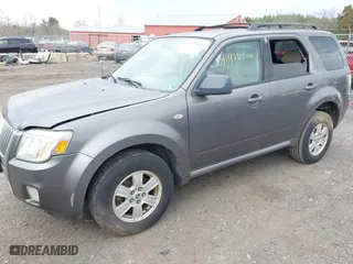 2009 Mercury Mariner with VIN 4M2CU91G49KJ05721, listed as a IAAI auction lot 41919006 with 105,537 mi miles. Bid and sale history available at carsss.com. Image 2.