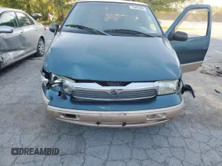 1997 Mercury Villager GS z VIN 4M2DV1119VDJ63417, wystawiony jako Copart lot #75462584 z przebiegiem 132 875 mil mil oraz Szkody całkowita. Historia ofert i sprzedaży dostępna na DreamBid. Obrazek 13.